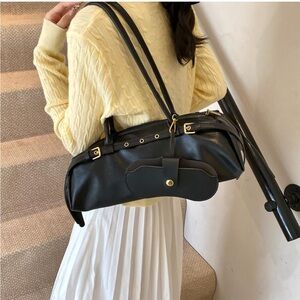 Black Leather Handbag with Gold Accents